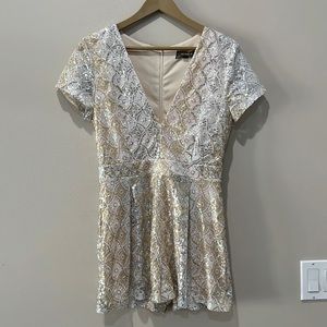 4SI3NNA Gold, Silver, and White Sequin Romper in size M